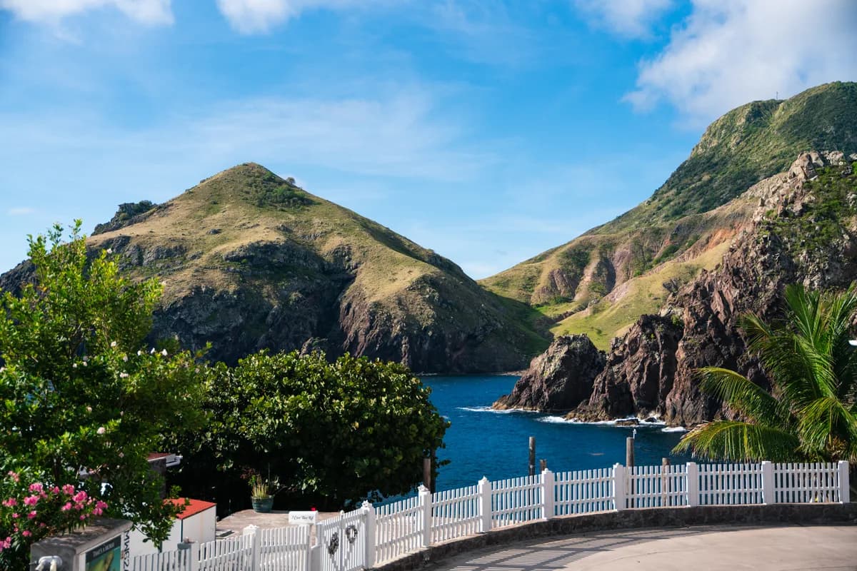 Cove Bay, Saba, framed by volcanic hills, Caribbean Netherlands.