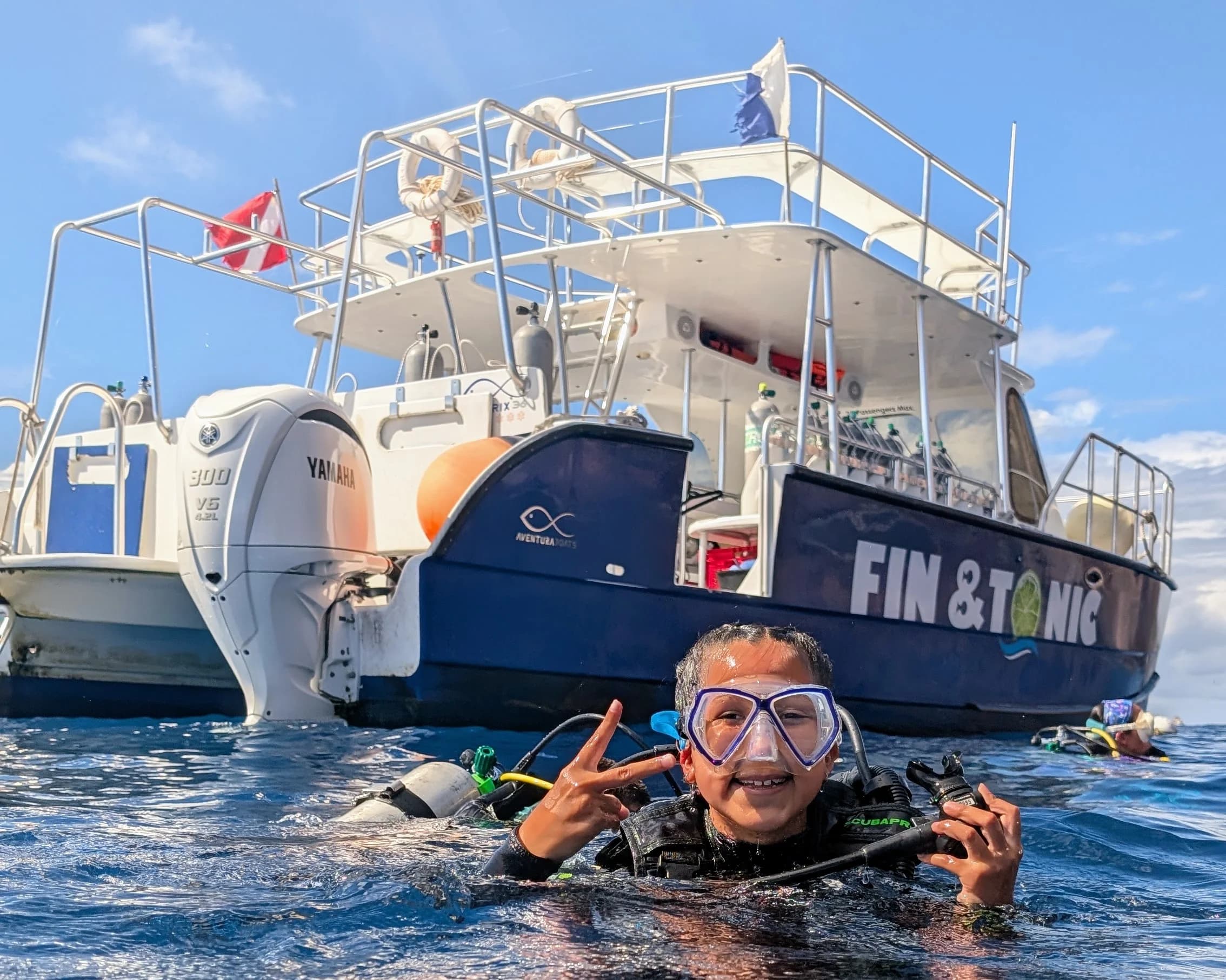 Scuba divers exploring the reef in the Saba Marine Park
